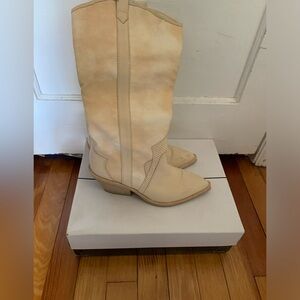A pair of cream color dolce vita cowboy boots, good condition!